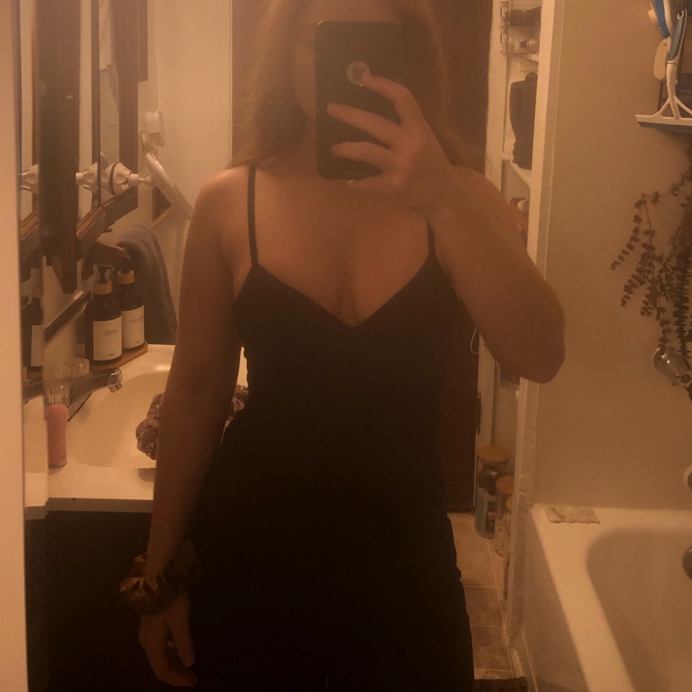 Black spaghetti strap top with built in bra support, size med